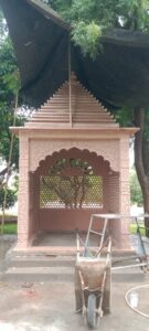 medium size garden temple carved in pink sandstone with jali screen