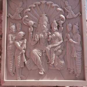 Handcrafted stone panel with traditional Indian carved artwork